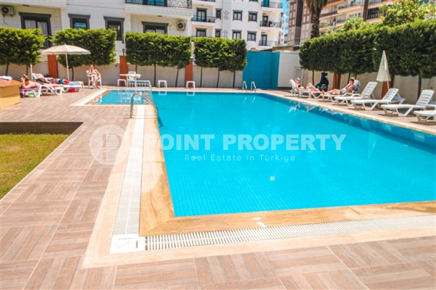 Comfortable furnished apartment 2+1 600 meters from the sea in the center of Mahmutlar-id-4752-photo-13