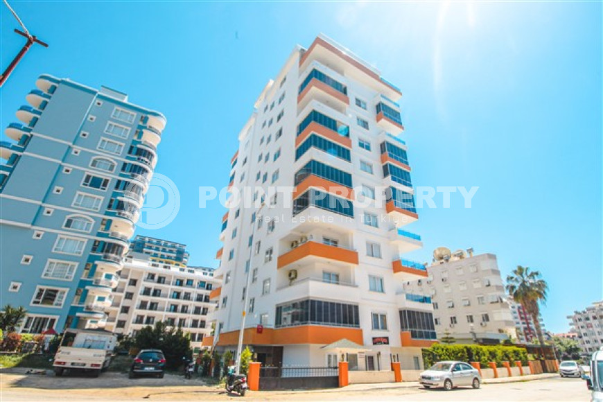 Comfortable furnished apartment 2+1 600 meters from the sea in the center of Mahmutlar-id-4752-photo-17