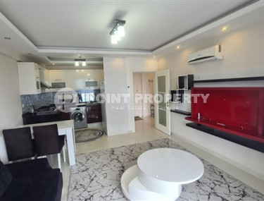 Небольшая двухкомнатная квартира 60 м2 с балконом в районе Махмутлар-id-4763-фото-2