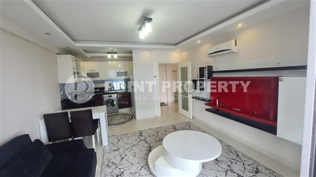 Небольшая двухкомнатная квартира 60 м2 с балконом в районе Махмутлар-id-4763-фото-2