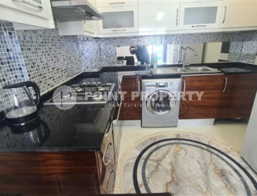 Небольшая двухкомнатная квартира 60 м2 с балконом в районе Махмутлар-id-4763-фото-3