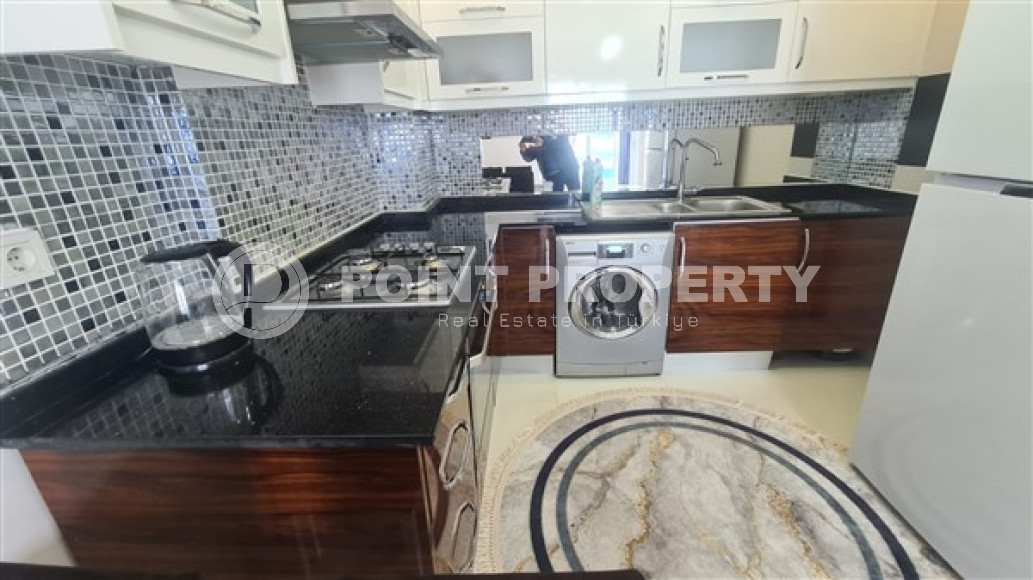 Небольшая двухкомнатная квартира 60 м2 с балконом в районе Махмутлар-id-4763-фото-3