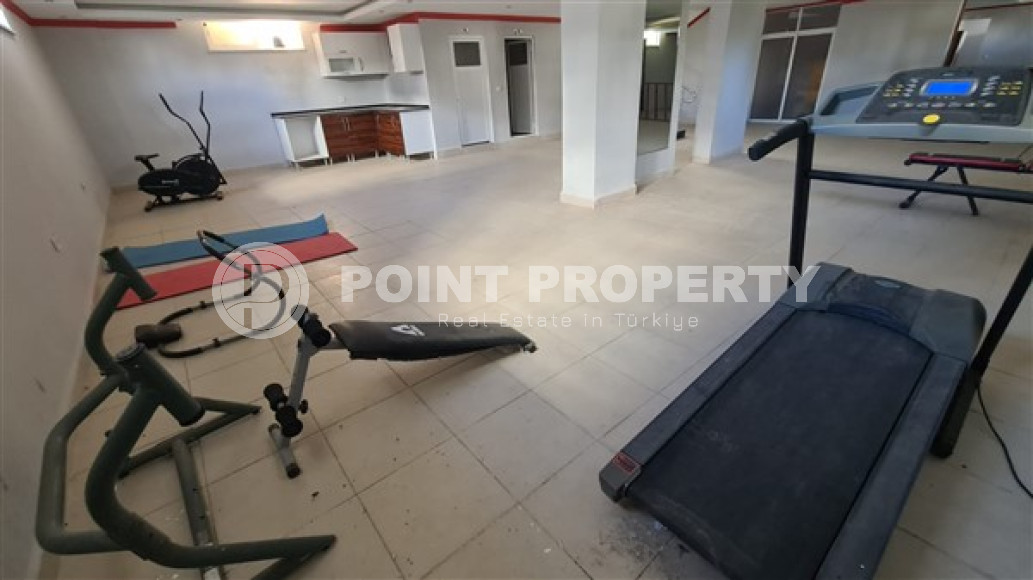 Небольшая двухкомнатная квартира 60 м2 с балконом в районе Махмутлар-id-4763-фото-8