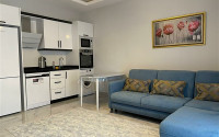 Compact apartment 1+1, total area 55 m2, 500 meters from the sea in the center of Mahmutlar-id-4768-photo-3