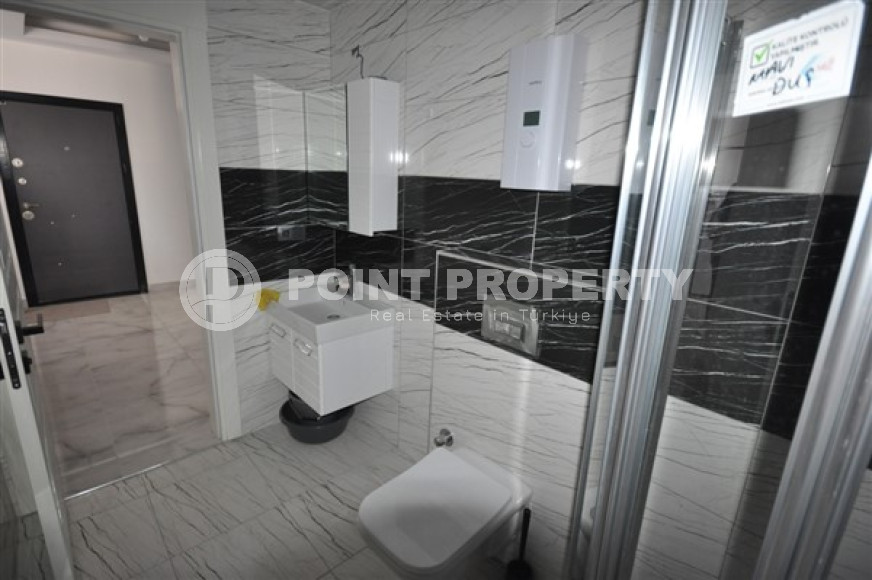 Compact apartment 1+1, total area 55 m2, 500 meters from the sea in the center of Mahmutlar-id-4768-photo-6