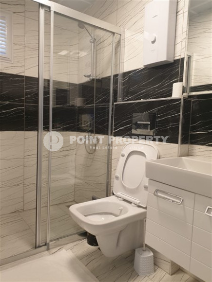 Compact apartment 1+1, total area 55 m2, 500 meters from the sea in the center of Mahmutlar-id-4768-photo-7