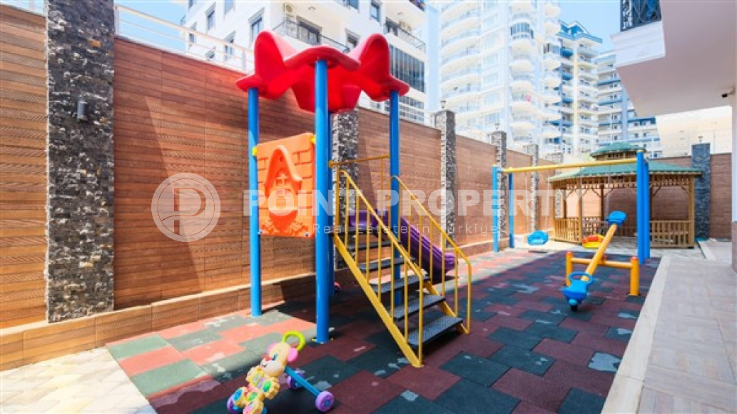 Compact apartment 1+1, total area 55 m2, 500 meters from the sea in the center of Mahmutlar-id-4768-photo-12