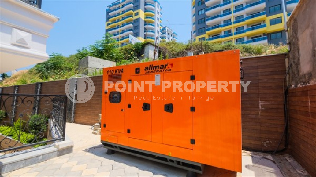 Compact apartment 1+1, total area 55 m2, 500 meters from the sea in the center of Mahmutlar-id-4768-photo-15