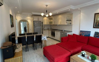 Spacious apartment with two bedrooms 600 meters from the sea in a quiet, landscaped area of Alanya - Tosmur-id-4769-photo-1