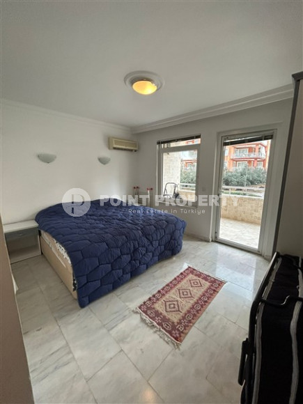 Spacious apartment with two bedrooms 600 meters from the sea in a quiet, landscaped area of Alanya - Tosmur-id-4769-photo-3