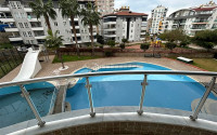 Spacious apartment with two bedrooms 600 meters from the sea in a quiet, landscaped area of Alanya - Tosmur-id-4769-photo-12