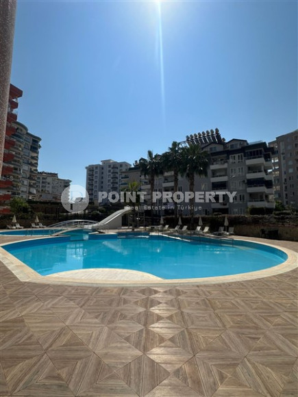 Spacious apartment with two bedrooms 600 meters from the sea in a quiet, landscaped area of Alanya - Tosmur-id-4769-photo-17