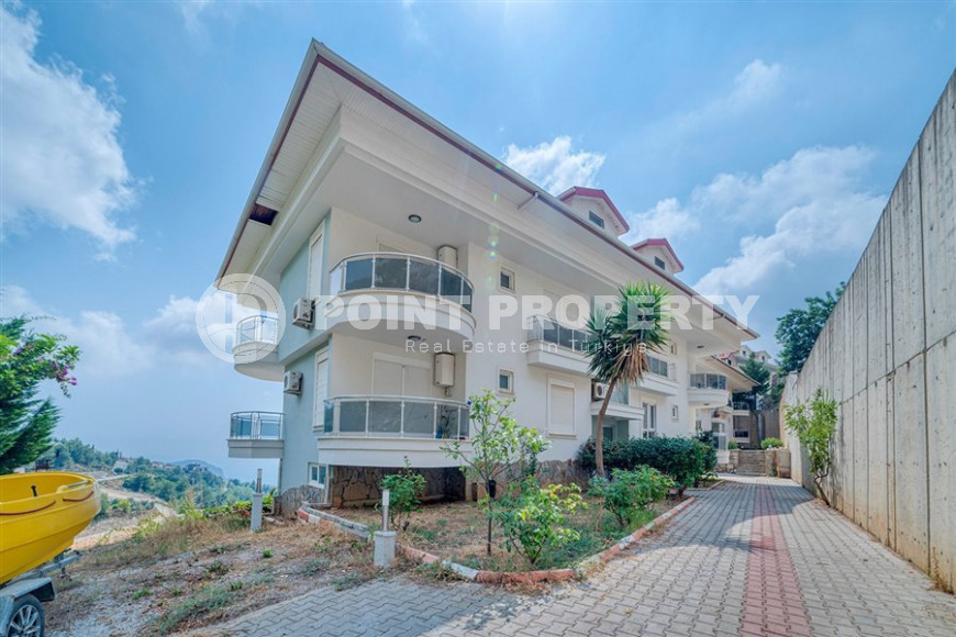 Three-room view apartment, 110 m², in a townhouse complex in the mountainous area of the center of Alanya - Bektas-id-1390-photo-6