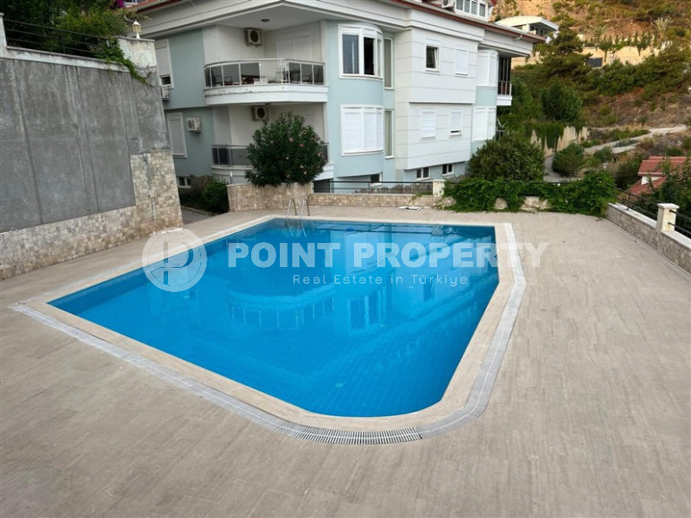 Three-room view apartment, 110 m², in a townhouse complex in the mountainous area of the center of Alanya - Bektas-id-1390-photo-18