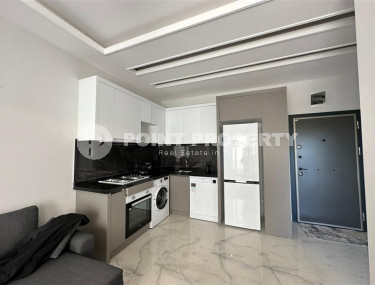 Стильная светлая квартира в новом комплексе с разнообразной инфраструктурой в Верхняя Оба-id-4779-фото-2