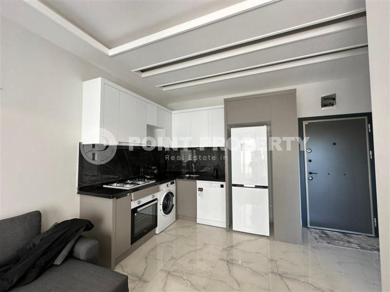 Стильная светлая квартира в новом комплексе с разнообразной инфраструктурой в Верхняя Оба-id-4779-фото-2