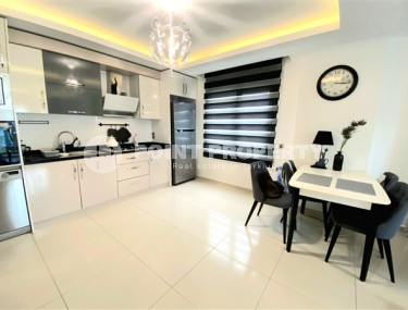 Comfortable 1+1 apartment with an area of 70 m2 with furniture, Mahmutlar district-id-4783-photo-2