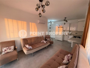 Inexpensive two-room apartment 60 m2 with a balcony and furniture, Mahmutlar district-id-4788-photo-1