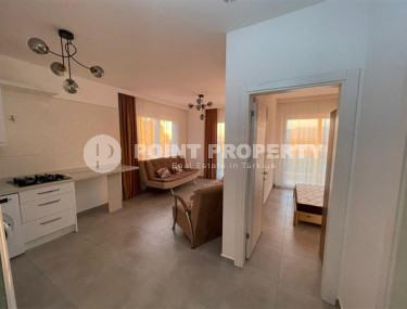Inexpensive two-room apartment 60 m2 with a balcony and furniture, Mahmutlar district-id-4788-photo-2