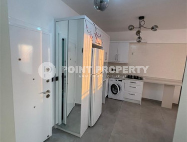 Inexpensive two-room apartment 60 m2 with a balcony and furniture, Mahmutlar district-id-4788-photo-3