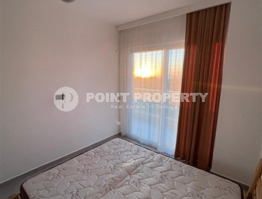 Inexpensive two-room apartment 60 m2 with a balcony and furniture, Mahmutlar district-id-4788-photo-4