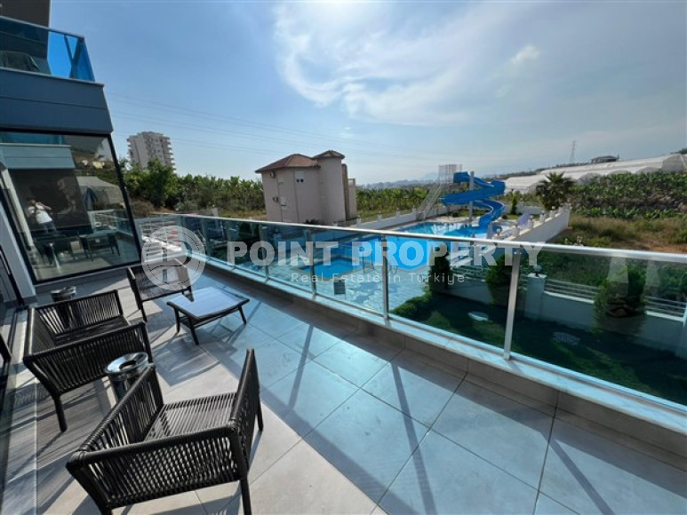 Inexpensive two-room apartment 60 m2 with a balcony and furniture, Mahmutlar district-id-4788-photo-7