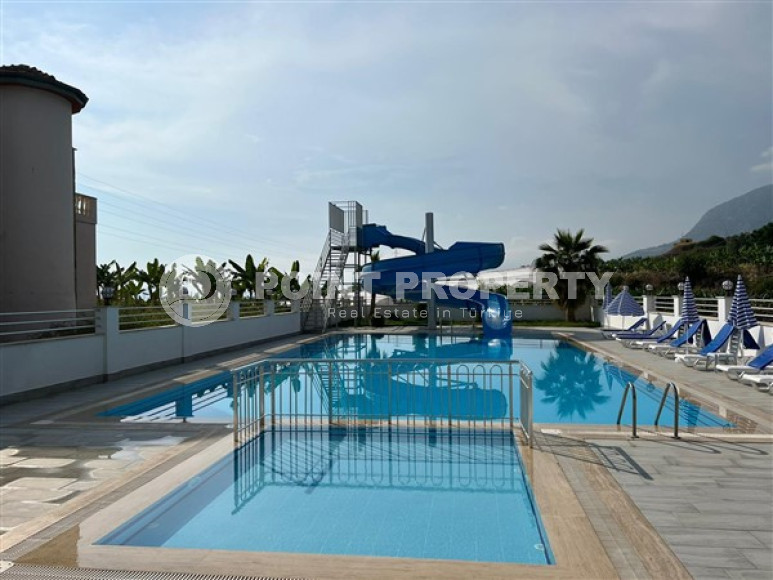 Inexpensive two-room apartment 60 m2 with a balcony and furniture, Mahmutlar district-id-4788-photo-9