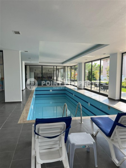 Inexpensive two-room apartment 60 m2 with a balcony and furniture, Mahmutlar district-id-4788-photo-10