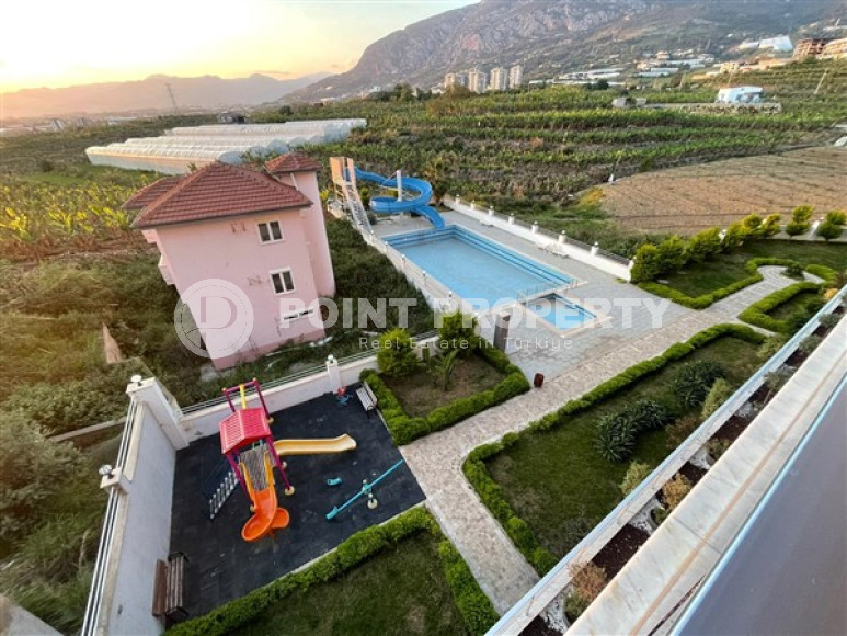 Inexpensive two-room apartment 60 m2 with a balcony and furniture, Mahmutlar district-id-4788-photo-13