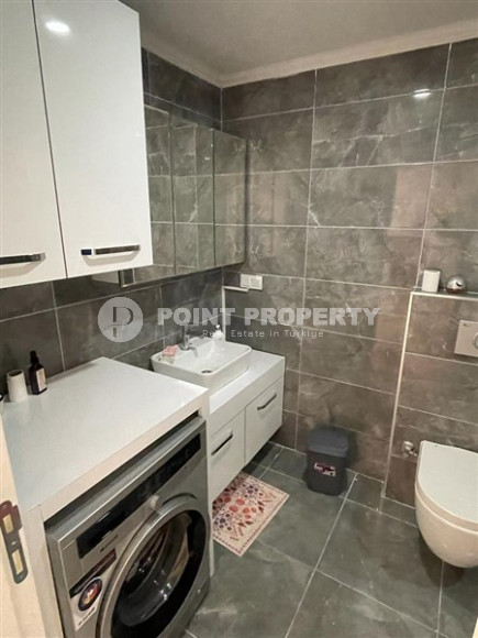 Двухуровневые апартаменты класса люкс в жилом комплексе отельного типа, планировкой 2+1, в 500 метрах от моря, район Кестель-id-4798-photo-7