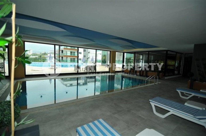 Двухуровневые апартаменты класса люкс в жилом комплексе отельного типа, планировкой 2+1, в 500 метрах от моря, район Кестель-id-4798-photo-15