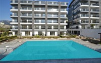 Apartment 1+1 with a balcony at the final finishing stage, Kargicak district-id-4810-photo-1