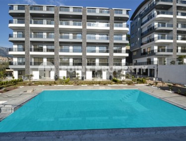 Apartment 1+1 with a balcony at the final finishing stage, Kargicak district-id-4810-photo-1