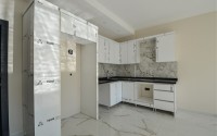 Apartment 1+1 with a balcony at the final finishing stage, Kargicak district-id-4810-photo-2