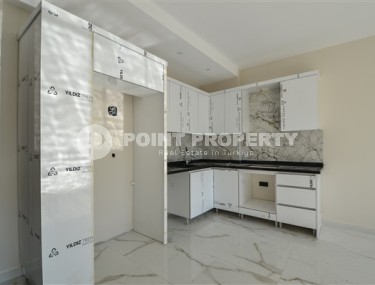 Apartment 1+1 with a balcony at the final finishing stage, Kargicak district-id-4810-photo-2