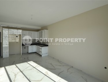 Apartment 1+1 with a balcony at the final finishing stage, Kargicak district-id-4810-photo-3