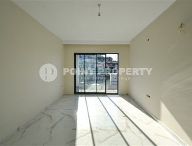 Apartment 1+1 with a balcony at the final finishing stage, Kargicak district-id-4810-photo-5