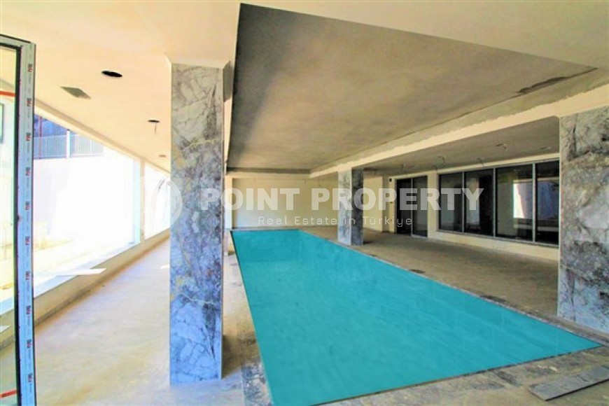 Apartment 1+1 with a balcony at the final finishing stage, Kargicak district-id-4810-photo-8