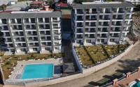 Apartment 1+1 with a balcony at the final finishing stage, Kargicak district-id-4810-photo-13
