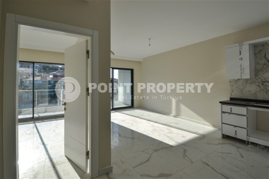 Апартаменты 1+1 с чистовой отделкой на 2-м этаже в резиденции на завершающем этапе строительства-id-4817-фото-2