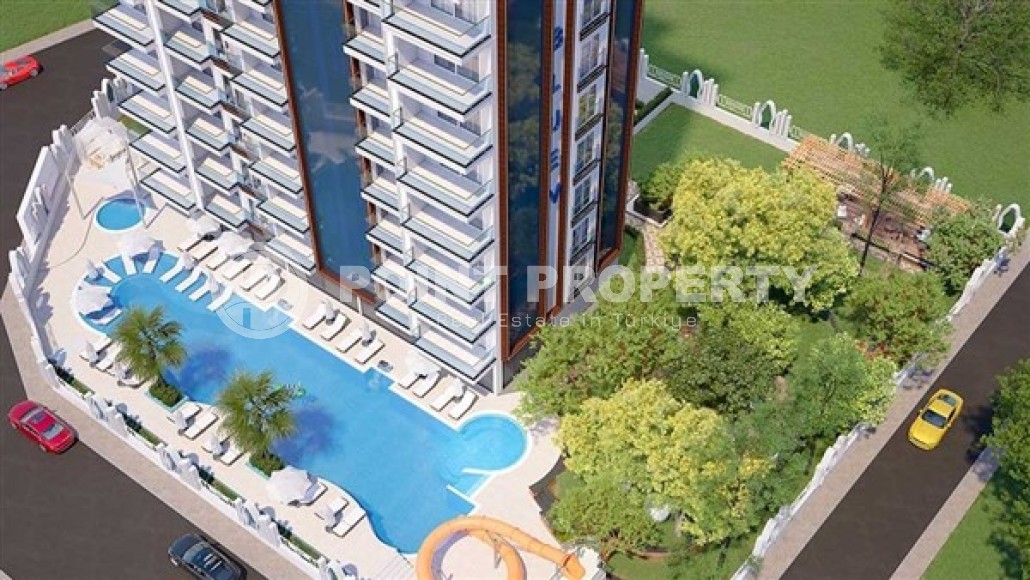 Apartment 1+1, total area 60 m2, in a residential complex under construction in the center of Mahmutlar district-id-4821-photo-8