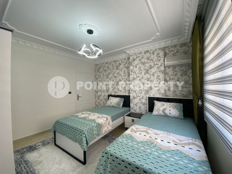 Two bedroom apartment for rent in a complex with a swimming pool, in the center of Mahmutlar, Alanya-id-4814-photo-12