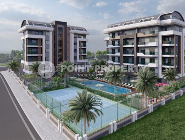 Comfortable apartments are available for sale, ranging from cozy 1+1 to spacious 3+1 duplexes, in the newest Okurcalar complex 300 meters from the sea.-id-1051-photo-1