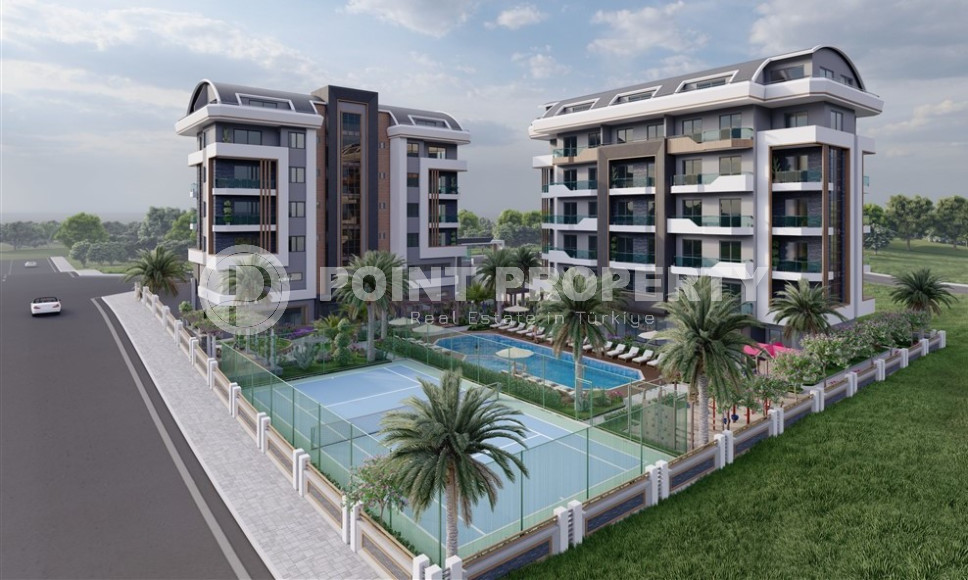 К продаже представлены комфортные апартаменты, начиная от уютно спланированных 1+1 до просторных дуплексов 3+1, в новейшем комплексе Окурджалара в 300 метрах от моря.-id-1051-фото-1