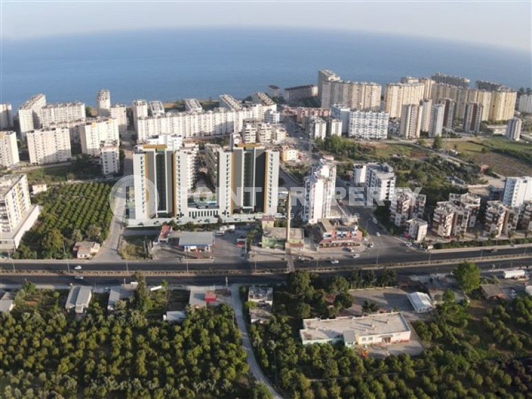 New apartments with an area of 75 - 120 m2 in a residence under construction with excellent infrastructure, Mersin, Tomyuk-id-4830-photo-8