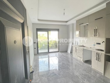 Небольшая квартира с чистовой отделкой, планировкой 1+1, в элитном районе Аланьи- Кестель-id-4833-фото-2