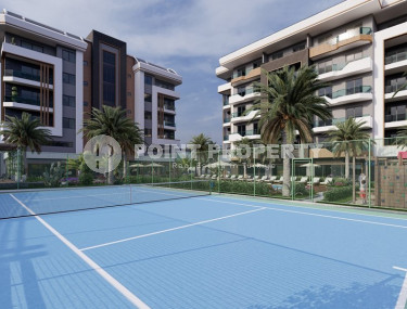 Comfortable apartments are available for sale, ranging from cozy 1+1 to spacious 3+1 duplexes, in the newest Okurcalar complex 300 meters from the sea.-id-1051-photo-3