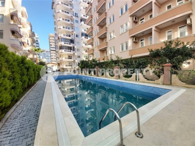 Budget apartment 1+1 400 meters from the beach in the center of Mahmutlar-id-4843-photo-12