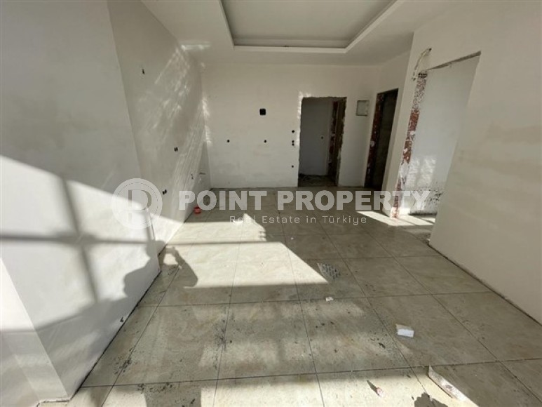 Apartments in a residence at the final stage of construction 450 meters from the sea in the center of Mahmutlar-id-4847-photo-3