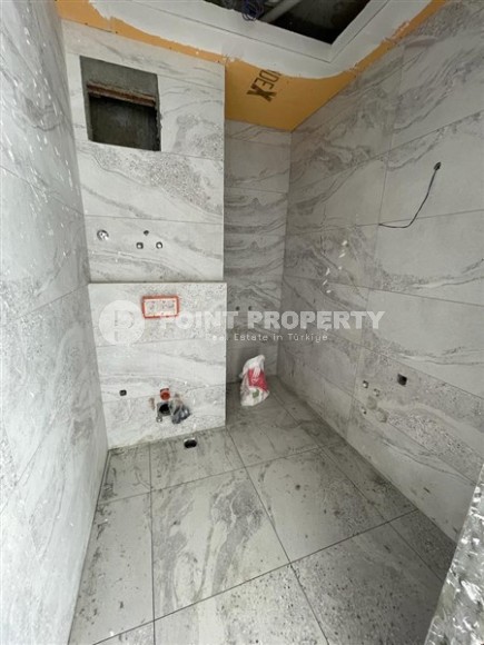 Apartments in a residence at the final stage of construction 450 meters from the sea in the center of Mahmutlar-id-4847-photo-6